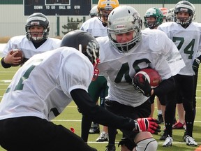 Players take part in hitting drills as 190 of northern Alberta's top bantam level football players gathered at Foote Field in Edmonton, AB. this weekend for the Football Alberta 2013 Bantam Bowl selection camp. TREVOR ROBB/EDMONTON EXAMINER