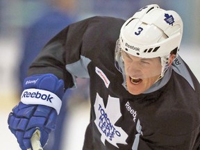 Dion Phaneuf shoots during Leafs practice at the MasterCard Centre. (DAVE ABEL/Toronto Sun)