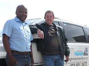 KEVIN RUSHWORTH HIGH RIVER TIMES. At left, Theo Ndlovu, manager of the Handi-Bus and Gord Orchard, part time driver, are encouraging people, regardless of their age, to phone the Handi-Bus if they need to get to a medical appointment, but cannot drive.