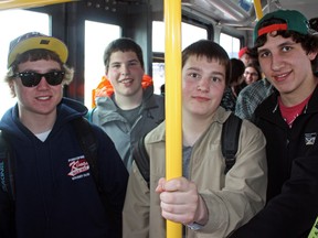 Timmins students and daily bus riders, from left, Greg Toal, Tyler Menezes, Josh Schmidt and Jake Fortin, were among the thousands of residents enjoying a free bus ride on Monday courtesy of Timmins Transit's celebration of Earth Day. Like many of the city's buses on Earth Day, Route 16 to Porcupine/South Porcupine was standing-room only.
