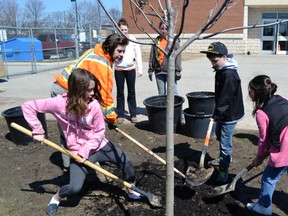 Earth Day activities were in full bloom in Goderich on Monday. Parks and Recreation staff, including Jennifer Sinclair, was at local schools to plant trees with students, as part of the town's Arbour Day.