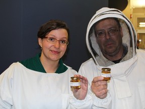 Aimée Lavoie,left, Projects Coordinator for TEBA, and René Bertrand, President of TEBA brought honey samples to city hall Monday night.