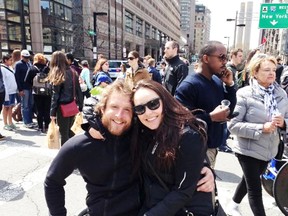 Wes Vick and his girlfriend Sophia Guertin celebrate after Vick finishes his first Boston Marathon last Monday, several hours before a bomb blast killed three and injured close to 200 at the finish line.