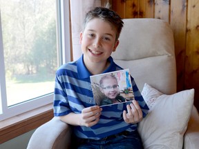Aidan Hussey holds a photo of his cousin Samantha, who died from cancer last year. Samantha was the inspiration for Aidan's speech in the Legion public speaking contests. He has won four rounds of the contest and is attending the provincial level of competition on May 4 in Toronto.

Emily Mountney Trentonian