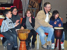 The Willems family of Champion, from left, Damian, 7, mom Melodie, Hayley, 9, dad Adam and Dantae, 7, participated in the drum circle session held at the Vulcan Legion Hall on Friday, April 12. The drum session was part of a free community meet and greet event called Strangers Are Friends You Haven’t Met Yet, which was sponsored by the Vulcan and District Ag Society, Vulcan Lionettes, Vulcan and District Family and Community Support Services and the Vulcan Business Development Society. About 40 people attended. A Rhythm Café drum group is hosted by the United Church at the church every second and fourth Thursday of the month starting at 7 p.m.