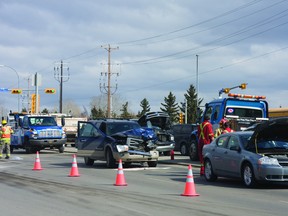 Airdrie, Alta. — Emergency crews worked to clean up a three-car pile up along Veterans Boulevard, just past Main Street, on April 18.