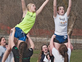 BRIAN THOMPSON, The Expositor

Tait de St. Croix (left) and Kiana Madia reach for the ball during a lineout during a practice for the BCI junior girls rugby team. The season starts Wednesday.