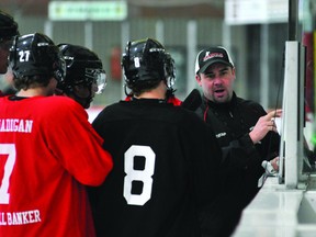 Jason Hawkins explains a drill to a group of Brockville Braves players during a team practice in October 2012. The Braves have fired Hawkins as the team's head coach and general manager after two seasons in the role, citing a desire to go in a new direction. (STEVE PETTIBONE The Recorder and Times)