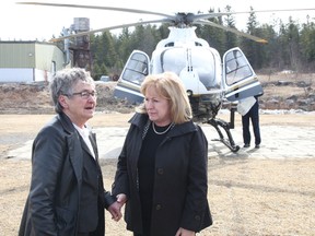 Madeleine Meilleur, right, Minister of Community Safety and Correctional Services meets with Markstay-Warren Mayor Sonja Flynn on Tuesday, April 23, 2013 in Markstay, Ont. JOHN LAPPA/THE SUDBURY STAR/QMI AGENCY