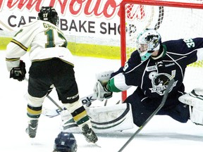 London Knights' Seth Griffith of Wallaceburg scores the winning goal on Whalers netminder Alex Nedeljkovic late in the third period of a 6-4 victory in Game 3 of the OHL Western Conference final Tuesday in Plymouth, Mich. (MIKE HENSEN/QMI Agency)