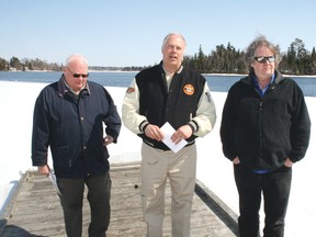 Lake of the Woods Development Commission Tourism committee chairman Randy Nickle (centre) is joined by commission chairman Don Denver (left) and vice chairman Mort Goss on the waterfront in Norman, Tuesday. Tourism Kenora hosted the media event where the commission representatives announced an online docking survey. Responses to the survey will provide base line information regarding existing docking facilities and the number of additional slips required for Kenora to fulfill its brand promise as North America’s Premier Boating Destination.
REG CLAYTON/Miner and News