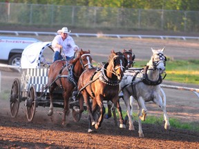 DHT file photo
High River, Alta.’s Jason Glass speeds down the track moments before he won last year’s Grande Prairie Stompede Dash for Cash with a time of one minute, 17.12 seconds.  If Glass repeats in 2013, he’ll get a healthy raise as the big race Sunday is now worth $25,000 plus the Sierra Series pickup and a holiday trailer or $5,000 supplied by Happy Trails. In total, Sunday’s purse has grown to $125,000.