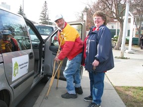 A staff member of Operation Friendship Seniors Society, an organization that has been providing a safe haven for seniors in Edmonton since city 1969, assists in taking a client to a medical appointment. Photo supplied