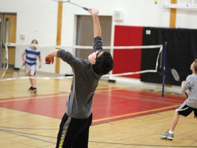 Jonathan Kipling jumps up to hit the birdier back across the net during the Grade 7 and 8 in-house tournament at St. Thomas Aquinas. The boys and girls of the Grade 7 and 8 badminton team are heading to Atikokan April 27.
GRACE PROTOPAPAS/Daily Miner and News