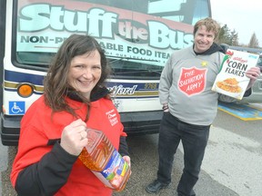 Jean Schwartzentruber, Operations Co-ordinator at Stratford House of Blessing, and Andrew Glenfield, Family Services Director at The Salvation Army, welcomed donations at the Stuff-the-Bus food drive kickoff last Saturday at Zehrs Markets in Stratford. (SCOTT WISHART, Beacon Herald)