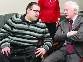 His Excellency the Right Honourable David Johnston, Governor General of Canada, chats with Brandon Harwood during a visit to Community Living Upper Ottawa Valley Tuesday afternoon.