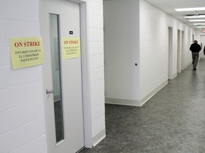 Lawyer Douglas Elliott displayed his frustration with the lack of government support with signs he posted on Thursday just down the hall from the inquiry hearing room.
Photo by JORDAN ALLARD/THE STANDARD/QMI AGENCY