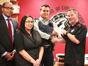 From left to right: Vice President and general manager of Eagle River Casino and Travel Plaza Eris Moncur, Alyssa Calliou, Eagle River Casino guest manager, Cpl. Dean Purcka of the Whitecourt detachment, Chris Keay, Althetic director for Hilltop High School, and Sgt. Ryan Comaniuk of the Mayerthorpe detachment.
Celia Ste Croix | Whitecourt Star
