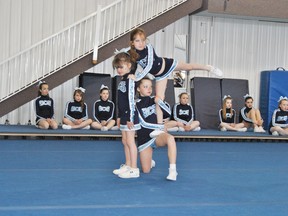 Taylor Wild, 7, Katie Dickson, 9, and Brianna Lambert, 7, perform a routine during the Sabres Cheer Spirit All Star Cheerleading Club’s open house on Saturday, April 20.
Barry Kerton | Whitecourt Star