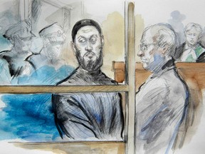 Via Rail terror accused Raed Jaser (L) and lawyer John Norris are pictured in a courtroom sketch at Old City Hall Court in Toronto April 23, 2013. (Pam Davies)