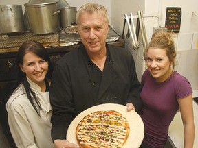 Big Hill Pizza has created a special pizza in support of the Glenbow Ranch Park Foundation.  Red Seal Chef Melissa Linton, Ron Knowles and Jenelle Lambert show off the creation. Linton says the ingredients are always freshly prepared daily and purchased locally.