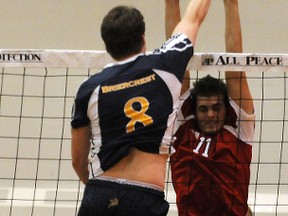 Wolves defender Devon Goodvin, seen here blocking in an ACAC game against Briercrest this year, was named the conference's Rookie of the Year in men's volleyball.