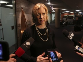Councillor Karen Stintz speaks with the media prior to the TTC meeting on April 24, 2013. (Jack Boland/Toronto Sun)