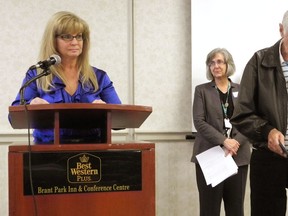 HUGO RODRIGUES, The Expositor

Lisa Gatt (left) speaks about her father, Ed Zombeck- one of 28 "Heroes in the Home" honoured in Brantford on Wednesday by the Hamilton Niagara Haldimand Brant Community Care Access Centre.