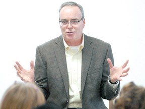 Author Terry Fallis speaks at the launch of The Evergreen Award program at the Local Community Food Centre Wednesday. Sponsored locally by Friends of the Stratford Public Library, the Evergreen program gives readers a chance to pick a favourite among a list of 10 Canadian books. Voting will take place during Canadian Public Library Week. Fallis also addressed the Alzheimer Society of Perth County gala. (SCOTT WISHART, Staff photographer)