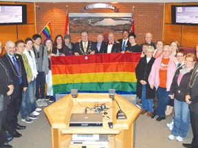 Members of Elliot Lake council and the local LGBT community along with supporters hold up the Rainbow Flag following Monday’s council meeting. 				     
Photo by KEVIN McSHEFFREY/THE STANDARD/QMI AGENCY