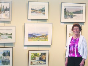 Local artist Linda Morrow stands in front of a wall of her own paintings that are currently being displayed at the Alberta Lottery Fund Art Gallery.

Photo by Aaron Taylor/Fort Saskatchewan Record/QMI Agency