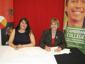 Mary Jane Archiabld, President at Apitisawin Employment and Training and Sylvia Barnard, President at Cambrian College signed a four year agreement on Tuesday that brings hands-on postsecondary training programs to the area starting with a Mining Foundations program this summer.
