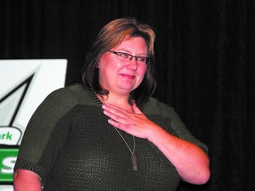 Sherwood Park Midget AAA Kings manager Kim Harder is overcome with emotion after being named the Kings club volunteer of the year at their recent awards night. Photo by Shane Jones/Sherwood Park News/ QMI Agency