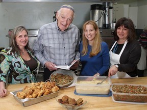Volunteers (from left) Bonnie Noss, Percy Marcus, Melissa Greenberg and Mindy Compeau prepare food for the 65th anniversary of Israel's independence at the Beth Israel Synagogue.
Ian MacAlpine The Whig-Standard