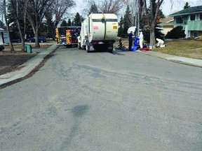 Emergency response crews attend a pedestrian-involved collision in Sherwood Park on Wednesday, April 24. A 46-year-old Sherwood Park woman was struck and killed by a recycling truck while she was crossing the street. Photo Courtesy Strathcona County RCMP