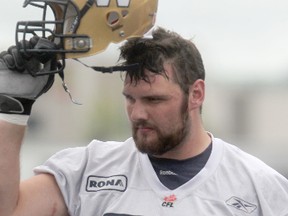 Blue Bomber #55 Paul Swiston works out at Canad Inns Stadium in Winnipeg.  Monday, June 18, 2012. (Chris Procaylo/Winnipeg Sun)