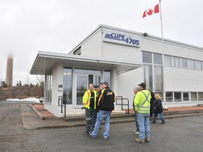 Members of CUPE Local 4705 outside unit prepare to enter the union hall on April 25, 2013 in Copper Cliff for a strike mandate meeting.
GINO DONATO/THE SUDBURY STAR