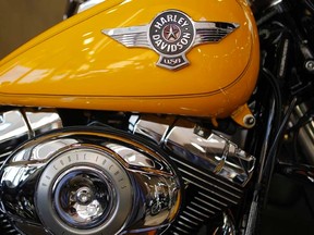 A Harley-Davidson motorcycle fuel tank and engine are seen in this file photo.
 REUTERS