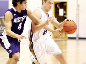 Chatham's Max Allin, right, of the Laurier Golden Hawks was the leading scorer in Canadian university basketball this season. (Photo courtesy of Laurier Athletics)