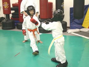 Two students of Kenora’s Can-Te IsshinRyu Karate School spar at practice. Both the Karate school and J & M Judo Club are hosting tournaments on Saturday, April 27 at Beaver Brae and St. Thomas Aquinas. 
GRACE PROTOPAPAS/KENORA DAILY MINER AND NEWS/QMI AGENCY