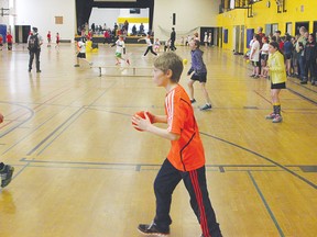 Will Sullivan, centre, and Myles Rowe, left, take part in the first ever fundraising dodgeball tournament, held at Felowes High School recently. More than 70 players took part. For more community photos, please visit our website photo gallery at www.thedailyobserver.ca.