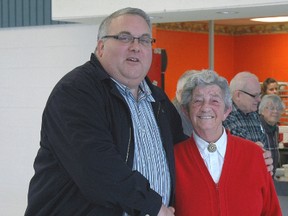 Elgin-Middlesex-London MPP Joe Preston congratulates Grace McKibbin, St. Thomas Seniors Centre board vice-president, following Friday's announcement the centre is the recipient of a $25,000 investment to assist with elder abuse awareness. Ian McCallum Times-Journal