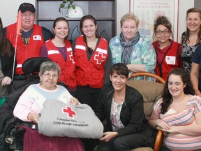 The Timmins Red Cross took the time to thank their volunteers on Friday afternoon at a Thank You Open House. From Meals on Wheels to the student hunger program, local Red Cross volunteers provide a friendly, familiar face to the international humanitarian organization. Back row, from left: Ashley Carter, KayLee Morissette, James Lanthier, Patricia Leonard, Wendi Ann Ticknor,  Gayle Lavigne, Dyneisha Dorrington, Carole Timm and Serena Besserer. Front row, from left: Vicky Sobon, Sylvie Dicaire and Caroline Caron.