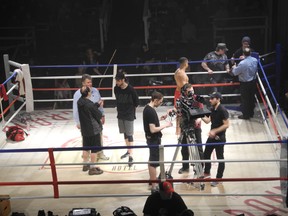 A Fighting Man film crew sets up cameras for the next scene in Sudbury, ON. on Friday, April 26, 2013. (Chelsey Roach for The Sudbury Star)