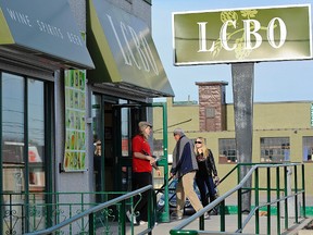 Shoppers drop by the LCBO outlet on Sherbrooke St. on Friday, April 26, 2013 in Peterborough. LCBO employees will be in a legal strike position on May 17th. Clifford Skarstedt/Peterborough Examiner/QMI AGENCY