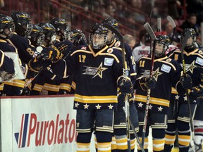 Members of the Sault North Stars congratulate each other following Friday's 9-2 loss to Rousseau Royal de Laval-Montreal