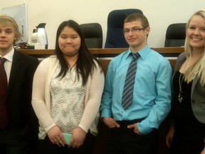 Top high school students participated in a mock sentencing presentation at the Sarnia courthouse. From left are Austin Kelway of Northern Collegiate, Quynh Le of St. Patrick, Kevin Leatherdale of SCITS and Alex Wallis of St. Christopher. NEIL BOWEN/THE OBSERVER/QMI AGENCY