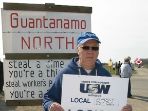 Paul Bird of Simcoe, a member of United Steelworkers Local 8782, protests outside the gates at the U.S. Steel plant at Nanticoke Sunday morning after being locked out by the company. Unionized voters have voted not to accept the company's last contract offer. (DANIEL R. PEARCE Simcoe Reformer)