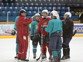 Trappers head coach Tom McCarthy talks to a group of his players in this file photo from February. North Bay is currently gearing up for the Dudley-Hewitt Cup which begins at the Memorial Gardens on Tuesday afternoon. The winner advances to the RBC Cup in Summerside, P.E.I.