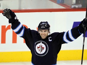 Winnipeg Jets left winger Andrew Ladd celebrates his shootout goal to defeat the Tampa Bay Lightning 4-3 during NHL hockey in Winnipeg, Man. Tuesday, April 16, 2013. (Winnipeg Jets left winger Andrew Ladd celebrates his shootout goal to defeat the Tampa Bay Lightning 4-3 during NHL hockey in Winnipeg, Man. Tuesday, April 16, 2013.
BRIAN DONOGH/WINNIPEG SUN/)